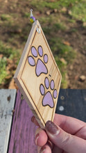 Load and play video in Gallery viewer, Purple Paw Prints Ornament