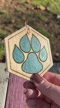 Load and play video in Gallery viewer, Dark Teal Paw Print Ornament