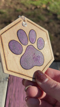 Load and play video in Gallery viewer, Dark Galaxy Purple Paw Print Ornament