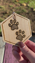 Load and play video in Gallery viewer, Brown Gold Paw Prints Ornament
