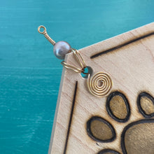 Load image into Gallery viewer, Brown Gold Paw Prints Ornament
