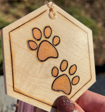 Load image into Gallery viewer, Orange Gold Paw Print Ornament
